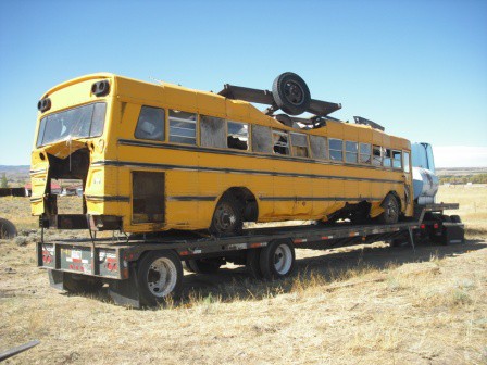 Empty school bus = steel sided box to load smaller items
